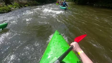 kayaking down a river