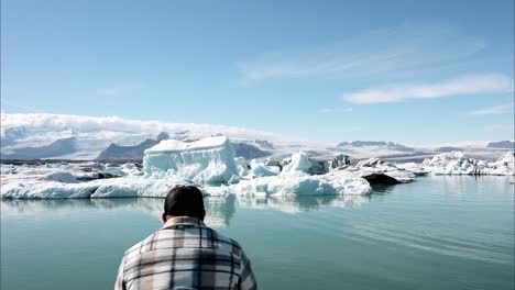 from behind looking at the glacial lagoon of iceland