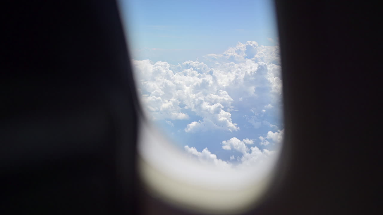 View of the clouds from an airplane window