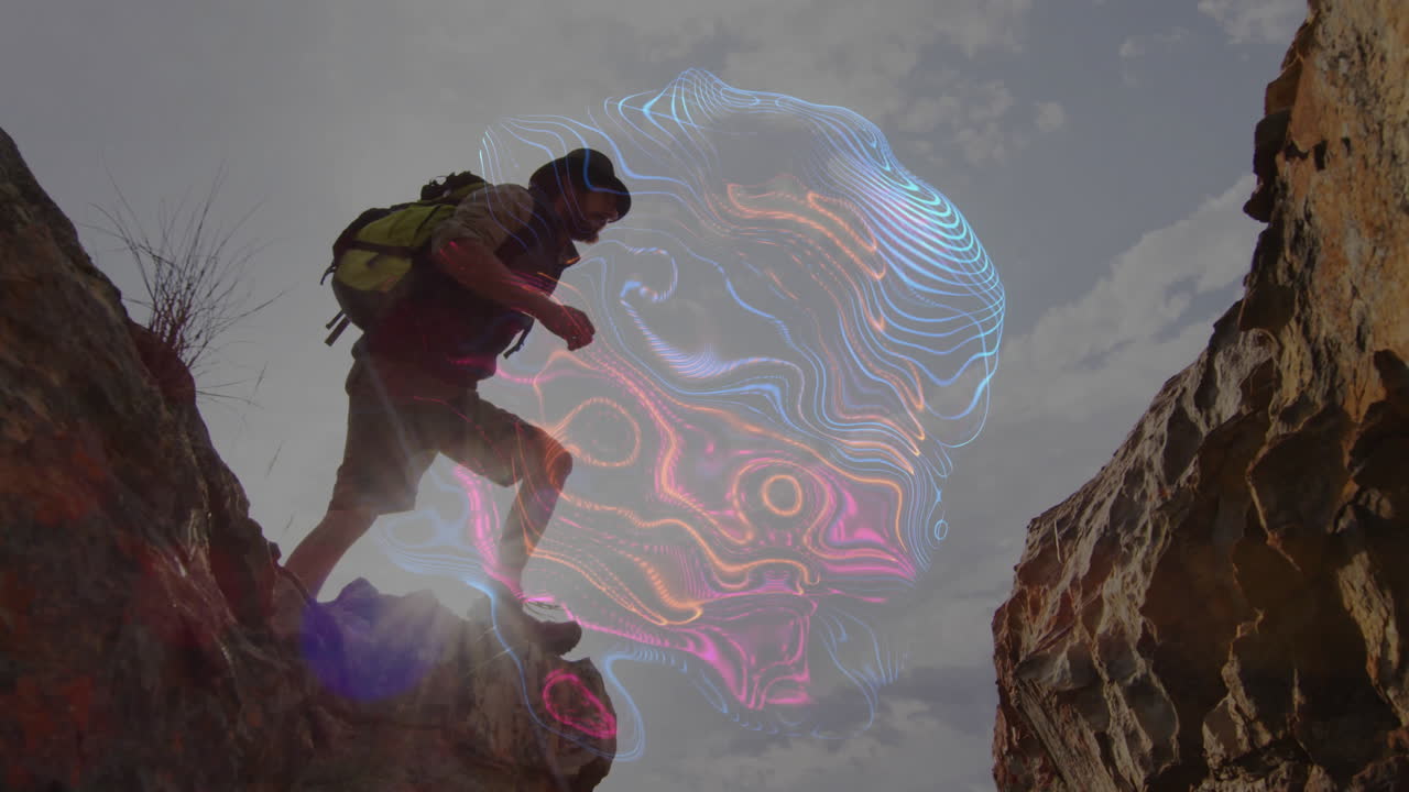 male hiker climbing rocky gap under cloudy sky showing neon digital swirl overlay for tech design