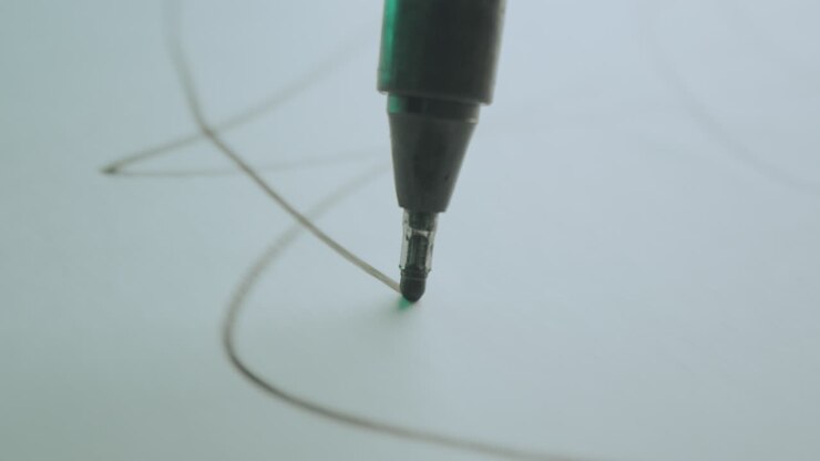 Close-up of a pen drawing on paper