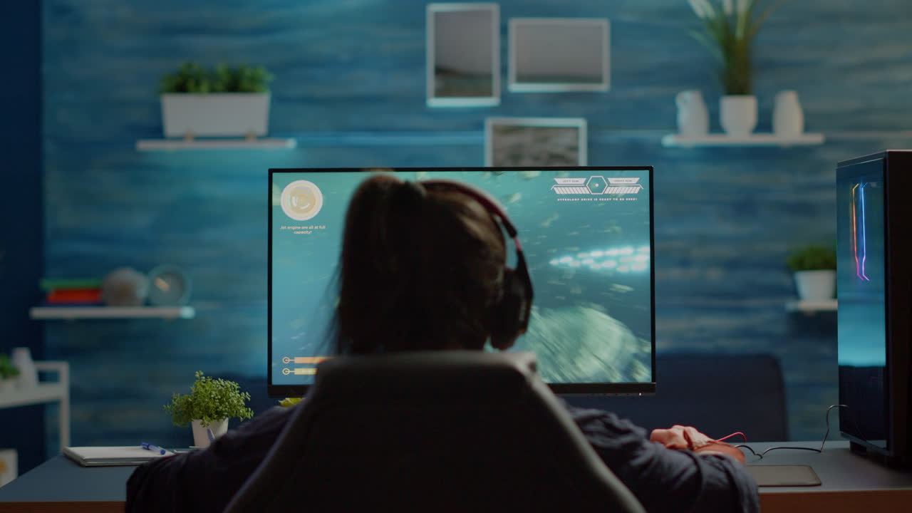 헤드 ⁇ 을 착용한 프로 여성 게이머가 우주 슈팅 게임을 잃고 있습니다.