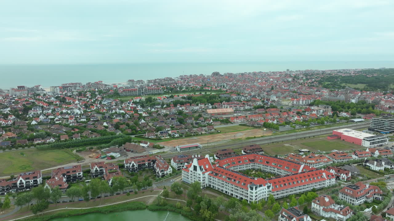 Wide Angle Aerial Orbit of Knokke City at the Belgian North Sea Coast