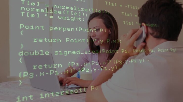 Programming code animation over people working on laptops in office