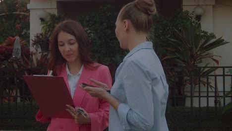 real estate agents discussing property deal