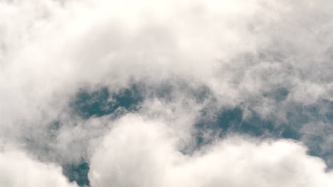 fluffy white clouds blown by the wind and moving in the sky in tokyo, japan. -wide shot
