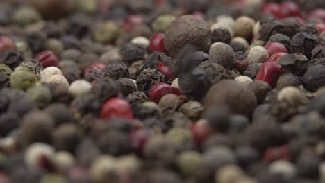 black peppercorns texture. the peppercorns slider falls into a huge pile