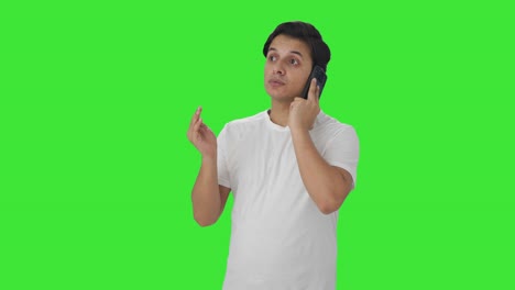 Indian-man-talking-on-call-Green-screen