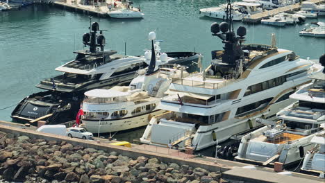 elite yachts moored at scenic port de la rague