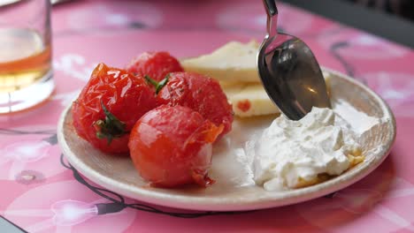 roasted cherry tomatoes with whipped cream and cheese