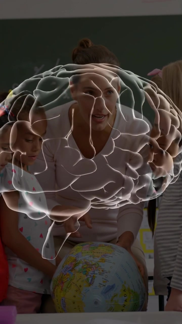 Vertical video: Rotating brain revealing teacher leaning, guiding kids touching globe for learning