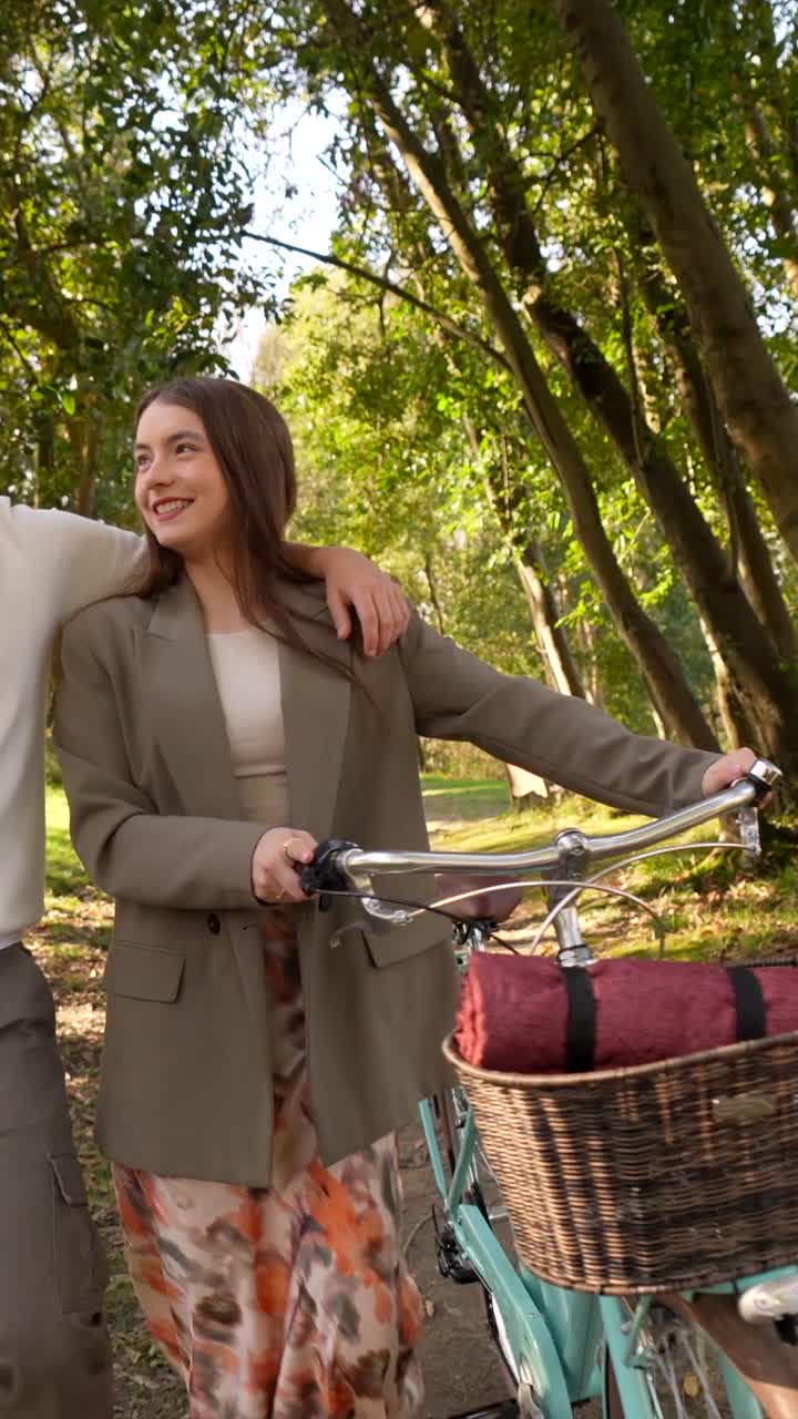Couple with Bicycle in Park