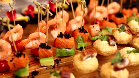 shrimp and salmon skewers with avocado and caviar