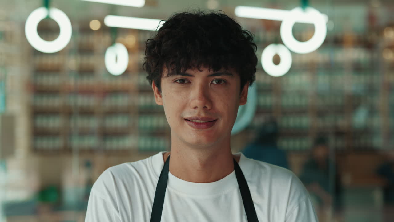 Portrait of a shop waiter