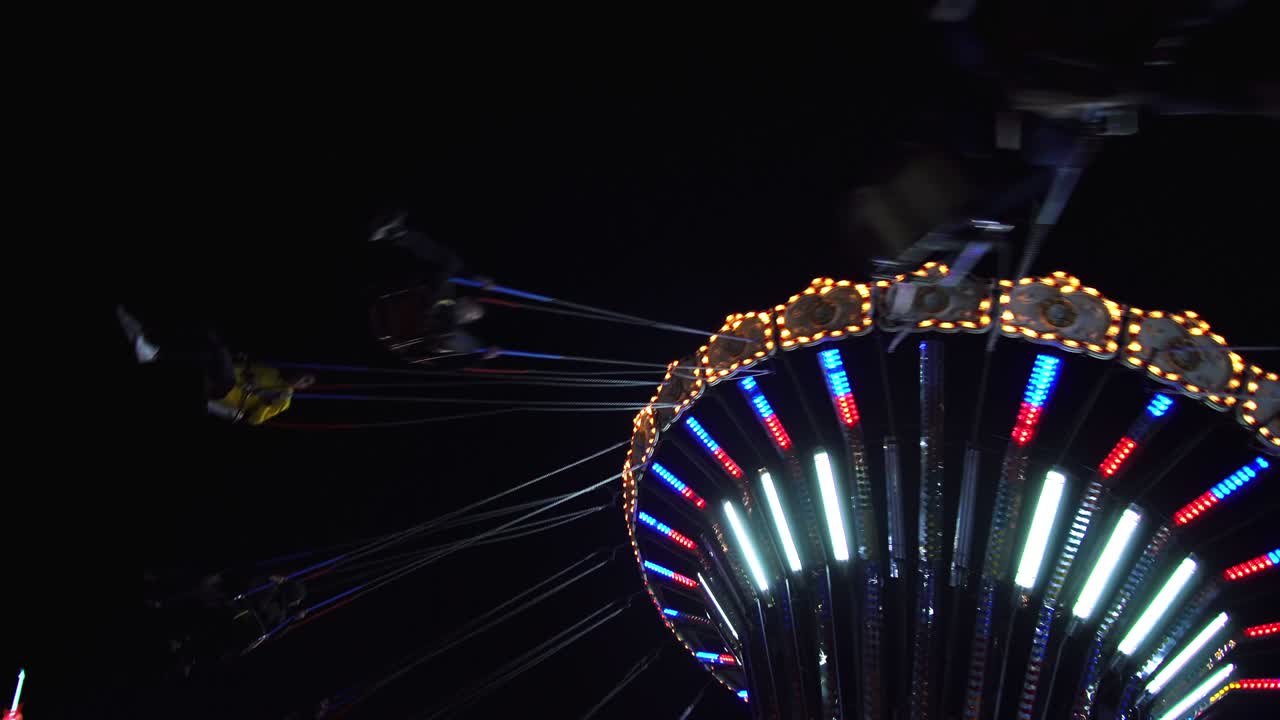 Carousel chair rotation in the evening during the Christmas holidays