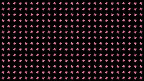 animation of rotating crosses on black background