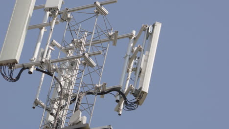 View-against-blue-sky-of-5G-phone-mast-structure