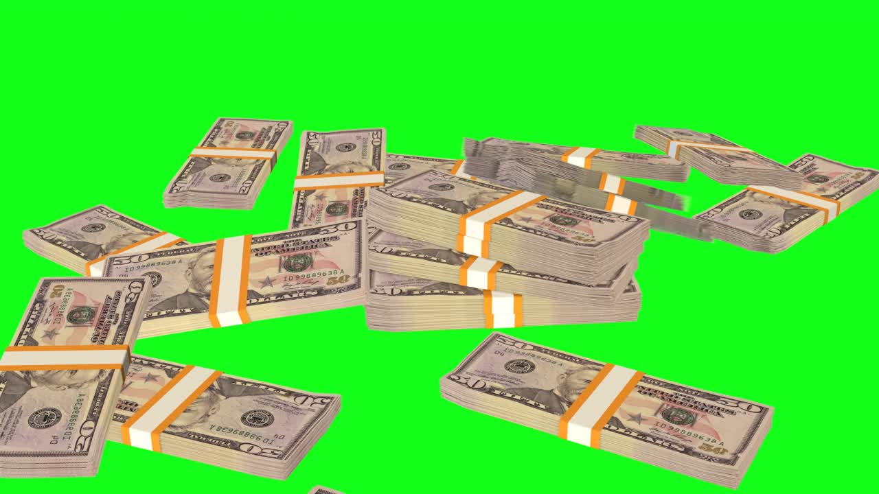 Many wads of money falling on chromakey background. 50 US dollar banknotes.