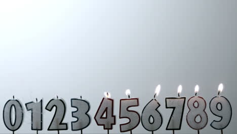 Number-candles-blowing-out-in-numerical-order-with-copy-space