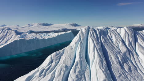 towering icebergs and frozen landscape in the arctic