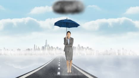 Composite-image-of-businesswoman-holding-an-umbrella