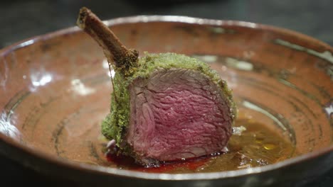 Plating-a-dish-with-Venison-meat-rib-slice