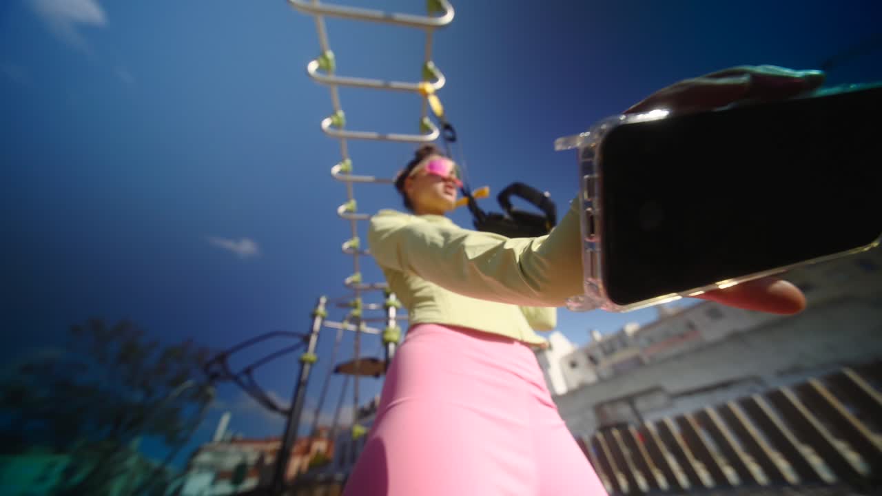 Woman taking a selfie during an outdoor workout session