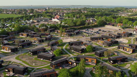 panorama of holiday park destinations with eco lodges in roompot beach resort brouwersdam, scharendijke, netherlands