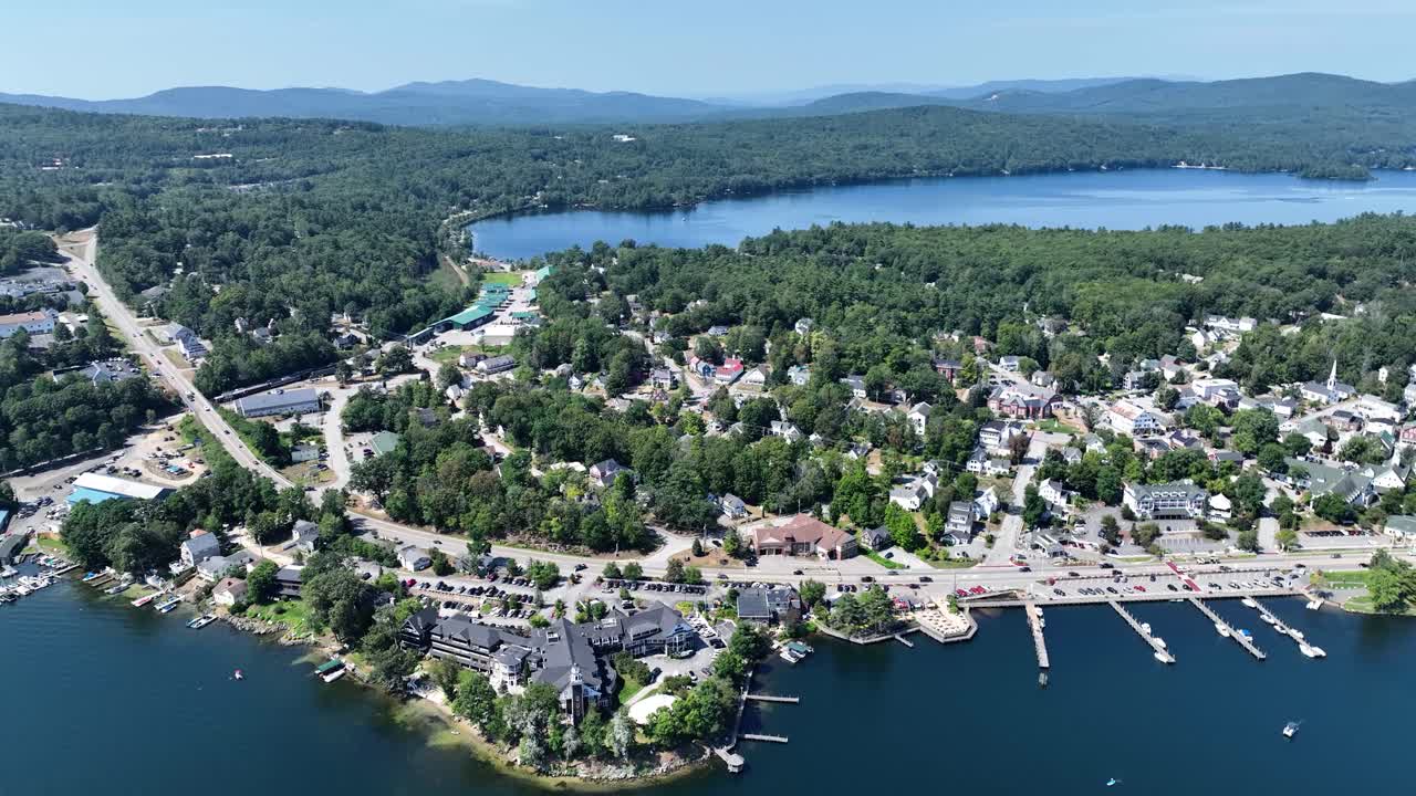 Drone view of Meredith, New Hampshire and Lake Winnipesaukee on a sunny day