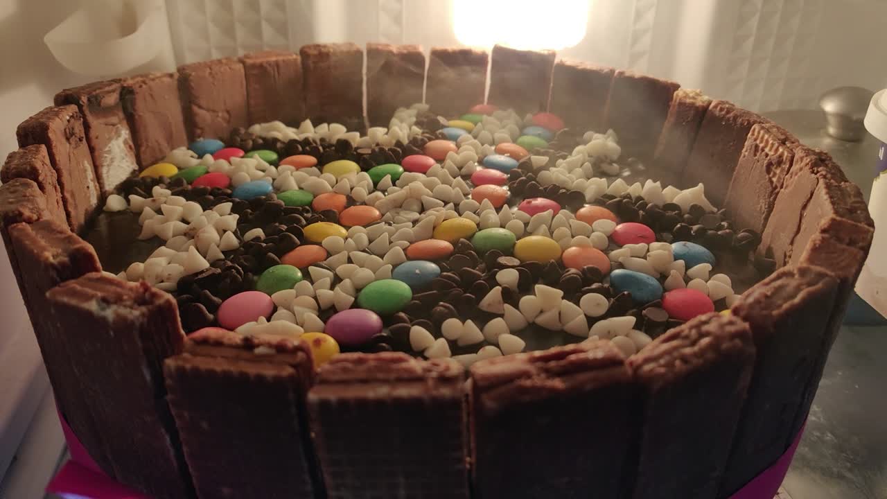 Beautiful cake made of for multiple colourful chocolates