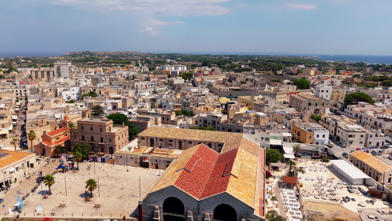 Aerial view of Favignana town, Aedagian Islands, Italy, sunny summer day