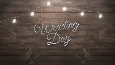 Closeup-text-Wedding-Day-with-flowers-and-lamps-on-wood
