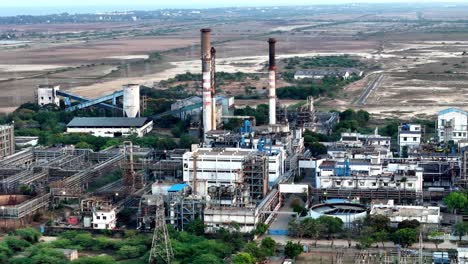 drone shot capturing an extensive pharma manufacturing plant in chennai. its intricate industrial structures and expansive facilities highlight precision production and global health contributions