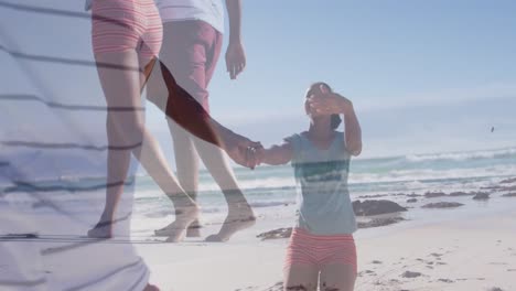 Animation-of-happy-african-american-couple-having-fun-on-beach-over-seascape