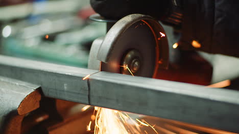 falling spark during cutting metal with angle grinder 3