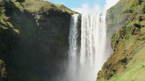 static shot of mighty skogafoss waterfall