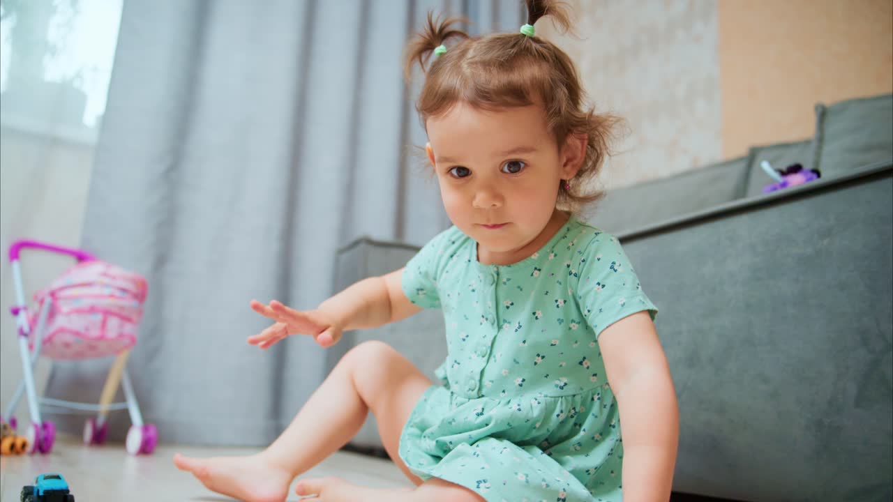 A Curious Toddler Engaged in Playtime with Toys on the Floor in a Cozy Room, Capturing Moments of Joyful Exploration and Innocence