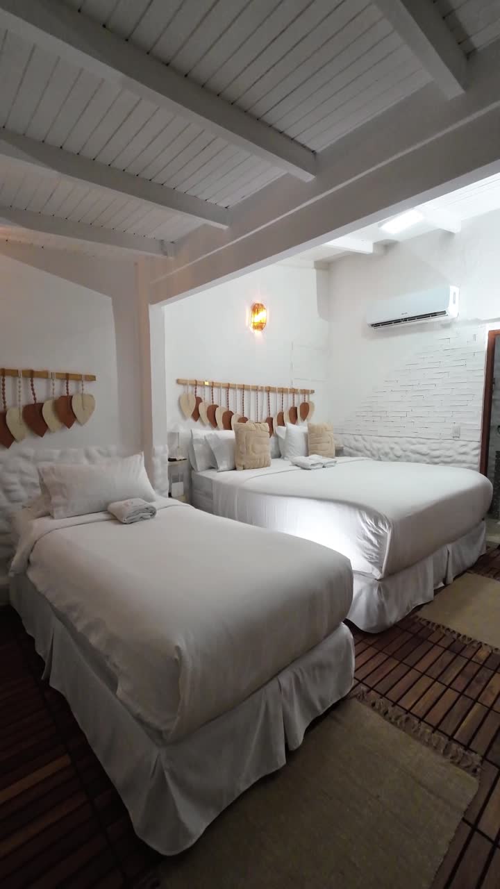 Vertical Wide shot tranquil and minimalist room interior, combining white walls and wood textures for a relaxing vacation aesthetic. eco-resort