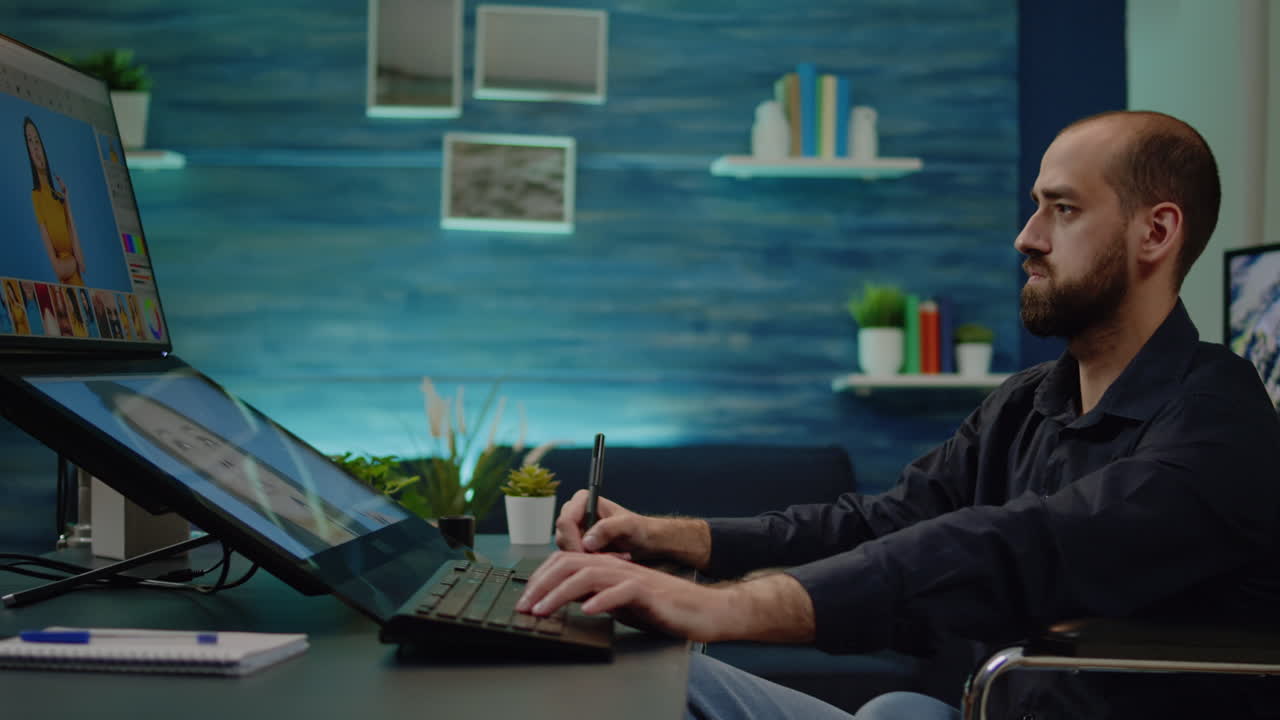 Photographer with disability doing retouch work on pictures