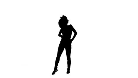 silhouette of a energetic woman dancing