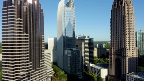 Drone shot slowly rising alongside skyscrapers in downtown Atlanta, Georgia