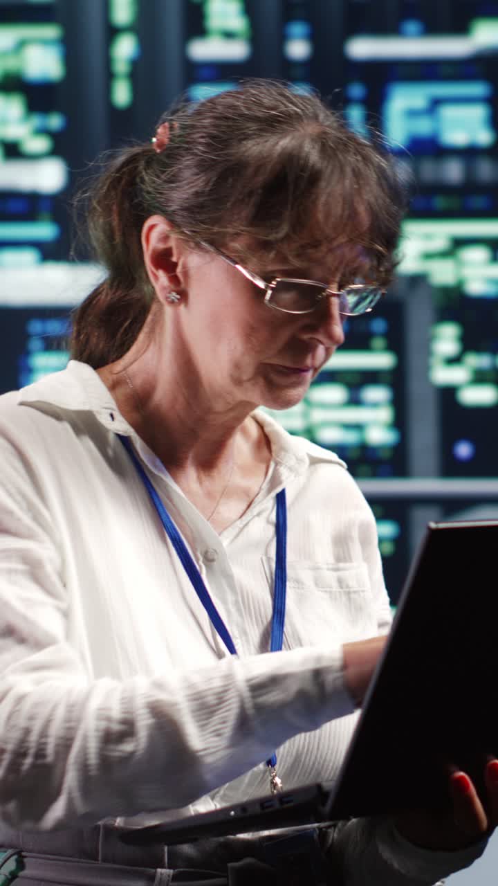 Woman Working in a High-Tech Security Control Room