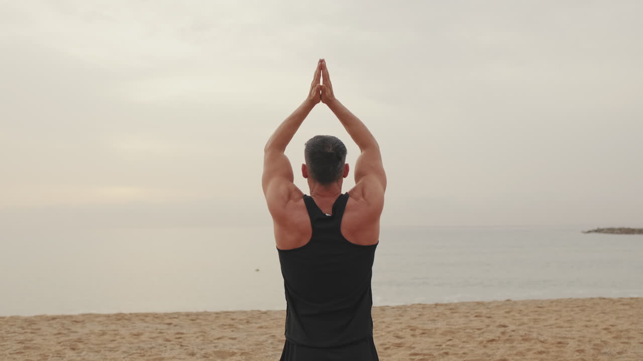 Man Exercising on the Beach