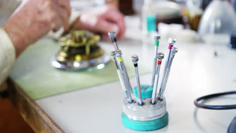 horologist repairing a watch