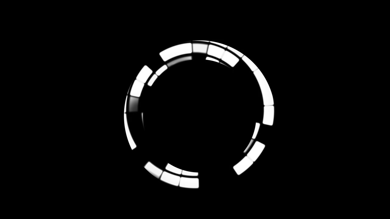 Red and white shapes rotating and moving outwards on a black background