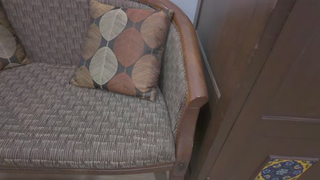 4k video of a couch with cushions in a hotel in india