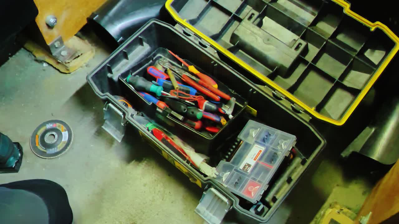 Hands of a craftsman arranging tools showing resilience and human recovery