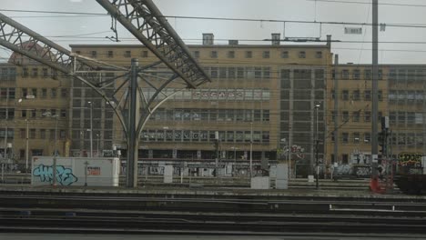 train yard with passenger trains and freight cars time lapse 4k 30p