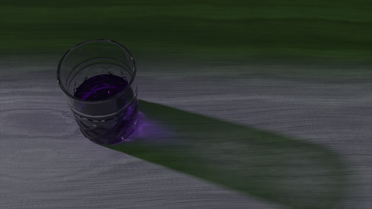Purple Drink in a Glass on a Wooden Table