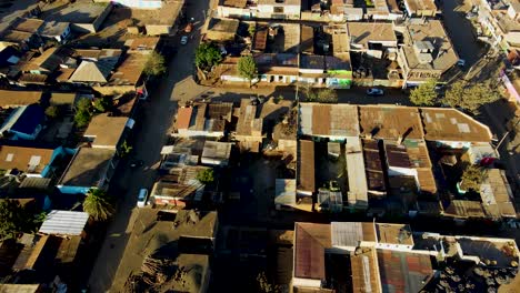 sunrise- kenya landscape with a village, kilimanjaro and amboseli national park - tracking, drone aerial view